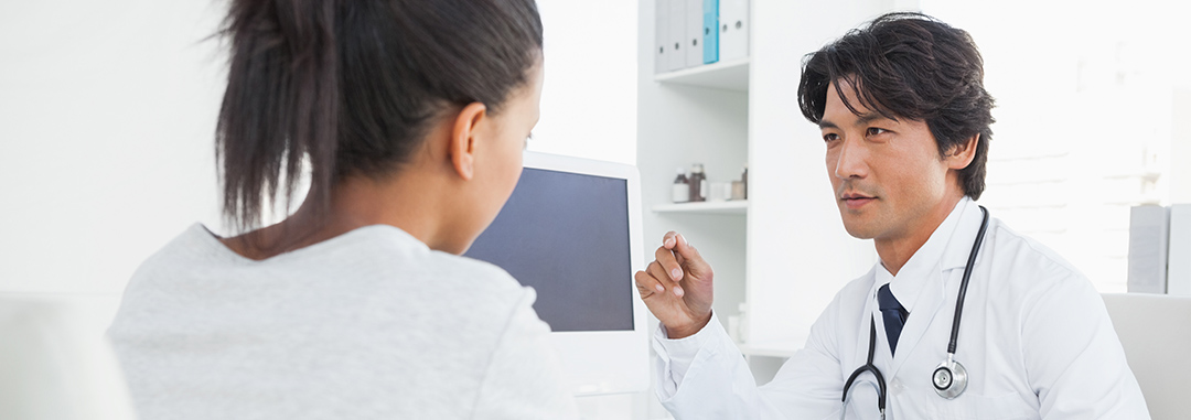 Woman consulting with an oncologist 